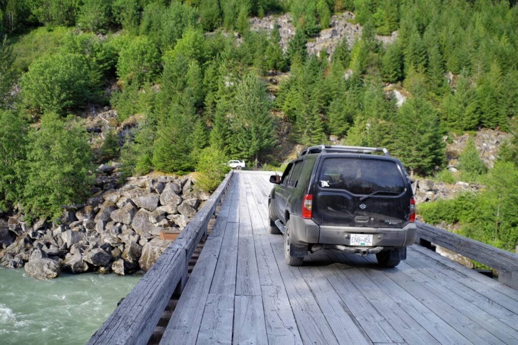 Driving over the Squamish River on a wooden bridge