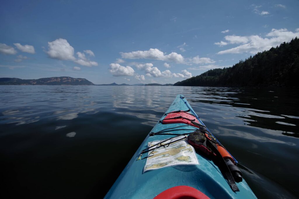 Mirror-like water as we kayak towards Prevost island.