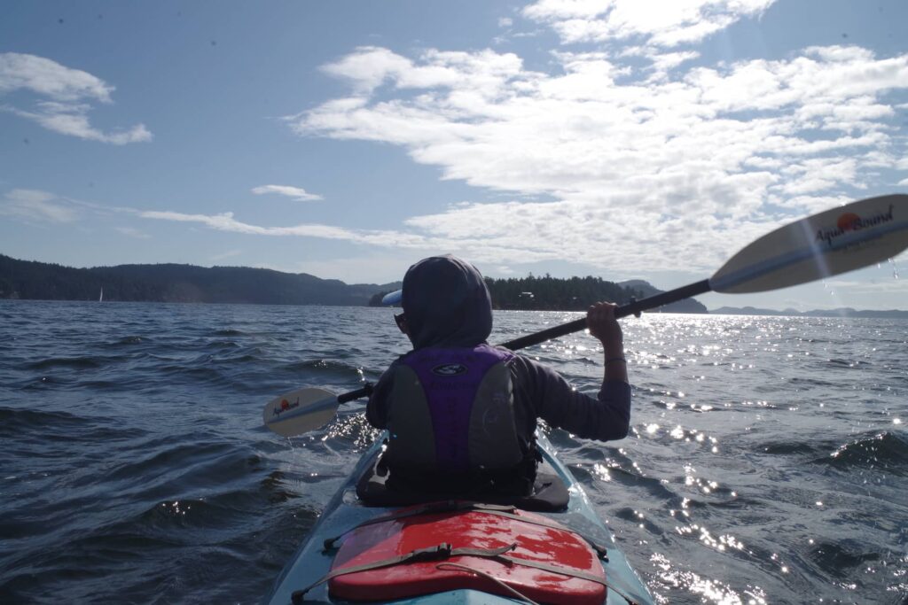Paddling across the Trincomali Channel.