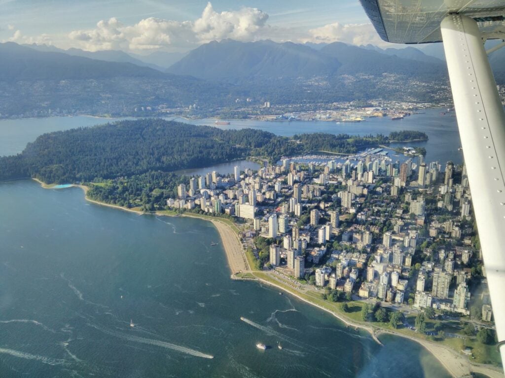 Photo from a float plane looking down over Vancouver and Stanley Park.