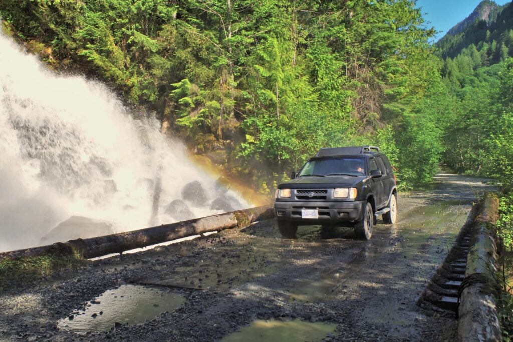 Driving past the thundering Maude Frickert Falls on the Squamish FSR